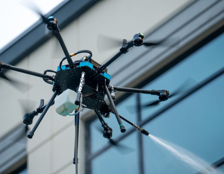 Drone in action cleaning a building